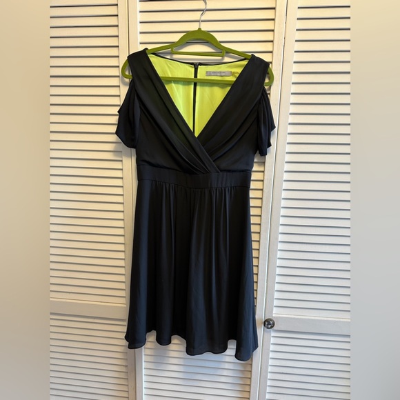 Andrew Marc Dresses & Skirts - Marc New York Andrew Marc Black Off Shoulder Dress with Bright Green Lining.